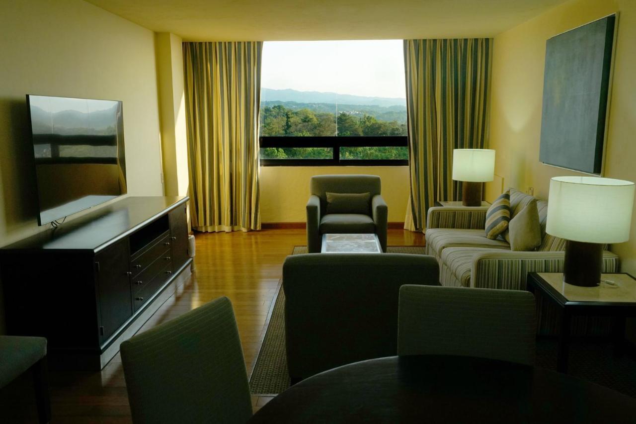 Gamma By Fiesta Americ Xalapa Nubara Exterior foto A living room