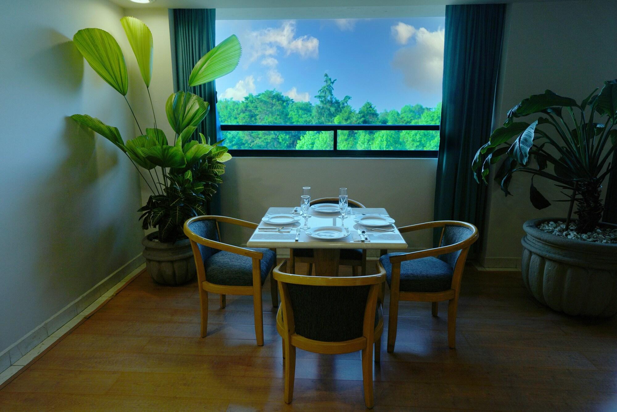 Gamma By Fiesta Americ Xalapa Nubara Exterior foto A dining room