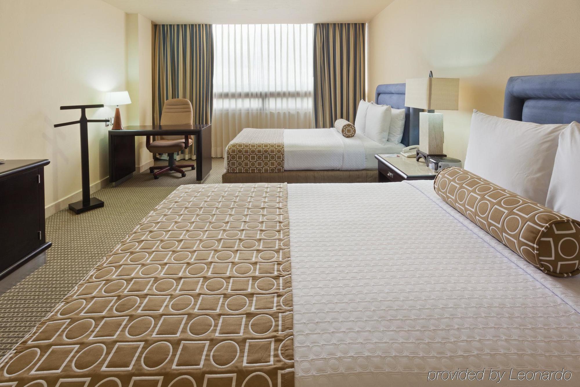 Gamma By Fiesta Americ Xalapa Nubara Exterior foto A room at the hotel